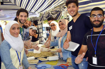 بالصور.. باش يشارك فريق " كنا وسنبقى" في حملة " كسرة خبز" بسوريا