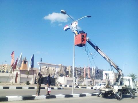 بالصور أعلام مصر وصور للسيسي بمدخل بورسعيد الجنوبي قبل افتتاح ظهر