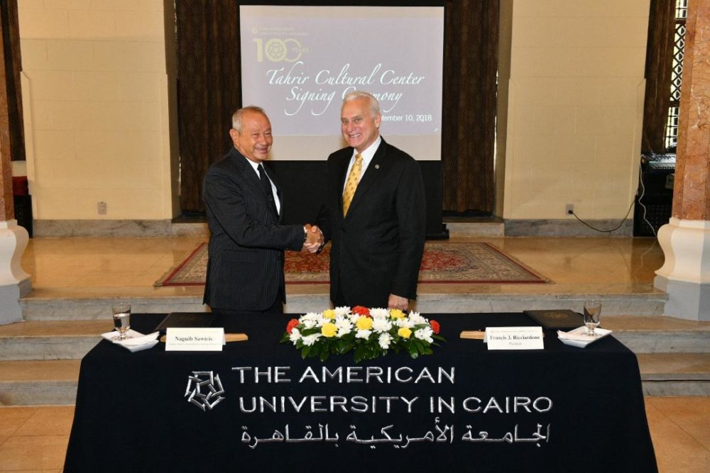 الجامعة الأمريكية توقع اتفاقية مع نجيب ساويرس لإنشاء مركز التحرير الثقافي