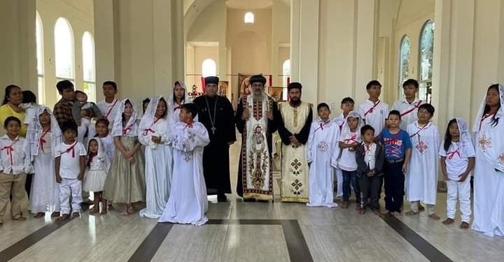معمودية ٢٢ شخص بالكنيسة القبطية الأرثوذكسية في بوليڤيا